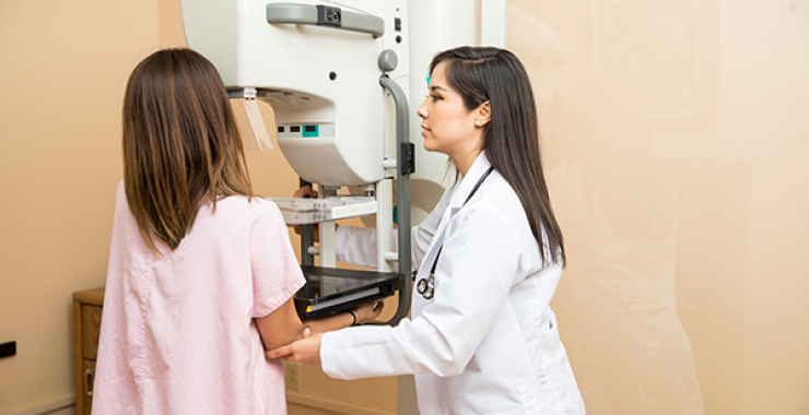 Woman getting a 3d Mammogram