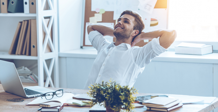 Man leaning back in chair relaxing