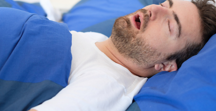 Man sleeping with his mouth open