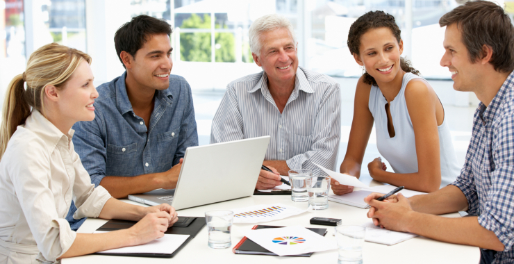 Group of people talking at a table