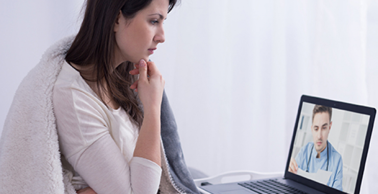Woman talking to doctor online